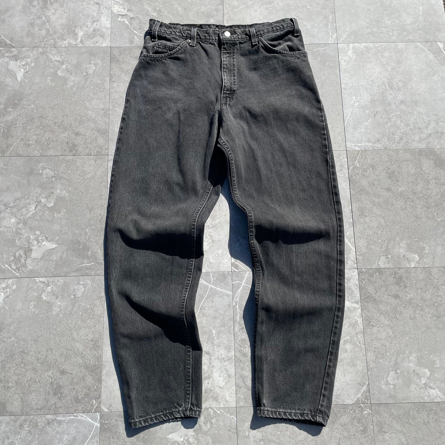 90s Levi's 550 Orange Tab Made in USA Black Denim 34x32 KiiChain Clothing