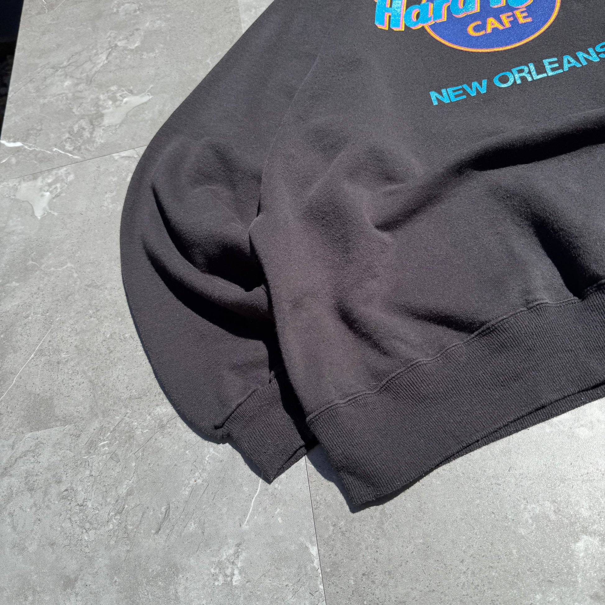 90s Hanes Hard Rock Cafe New Orleans Made in USA Black Crewneck Sweatshirt KiiChain Clothing